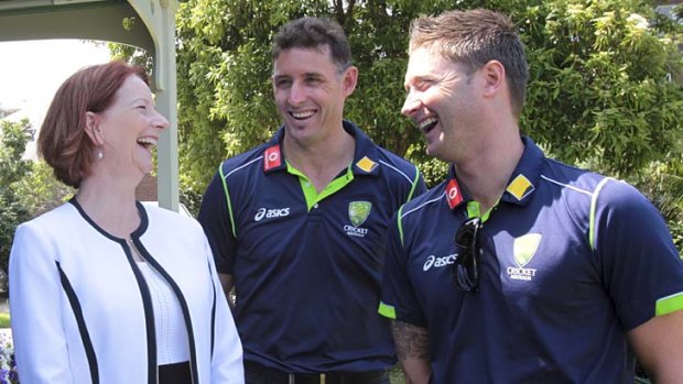 Nobody told them there'd be days like this ... Julia Gillard shares a joke with Michael Hussey and Michael Clarke at Kirribilli House.