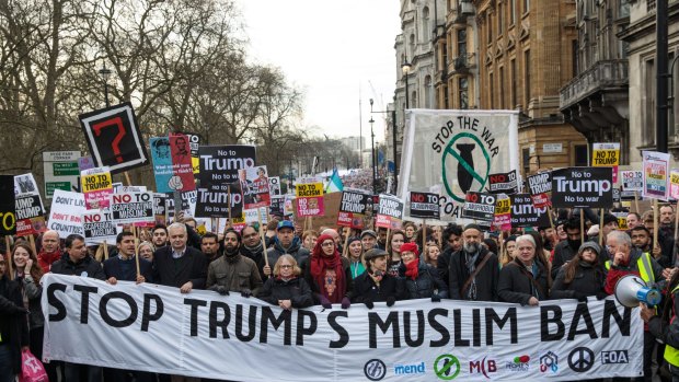 Thousands of protesters with banners and placards marched through central London on Friday.