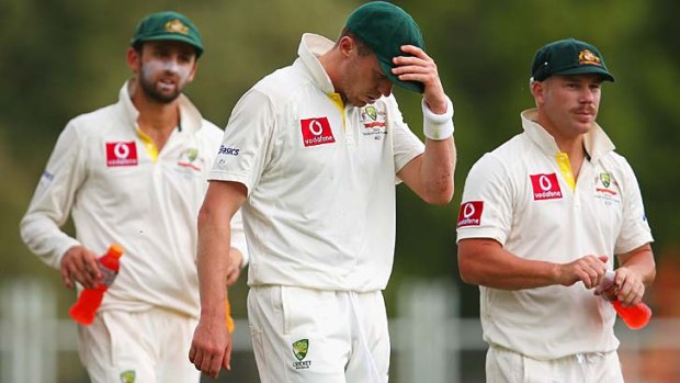 Hopes dashed: Nathan Lyon, Peter Siddle and David Warner at the end of the Adelaide Test.