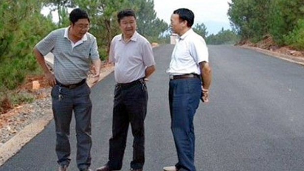 Huili local officials float above a highway project in China's Sichuan province under the guise of 'inspecting'