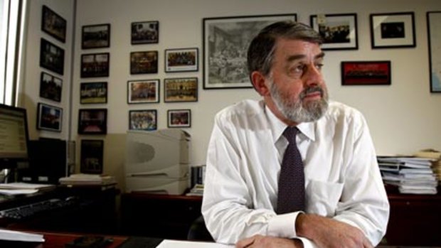 Conference future ... Director of Public Prosecutions Nicholas Cowdery, pictured in his office, has rejected criticism levelled at him by the Attorney-General.