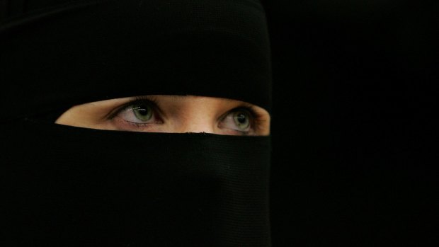 A woman wearing a niqab.