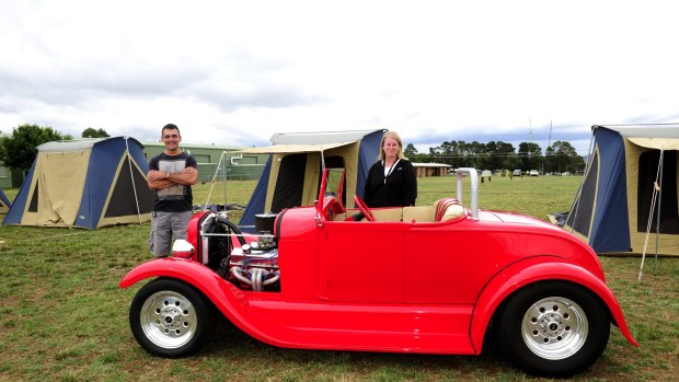 Summernats co-owner Andy Lopez and camping manager Tracy Kennedy admire a 1928 Ford roadster.