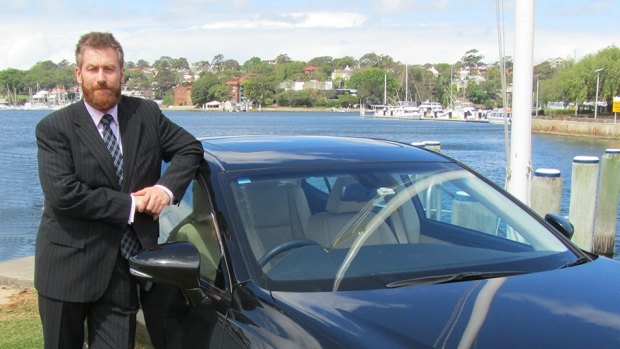 Russell Howarth with his hire car after he carried out his first citizen's arrest.
