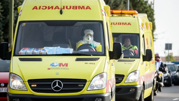 An ambulance transporting a potential Ebola virus carrier arrives at the Carlos III hospital in Madrid on November 21.
