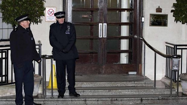 Police stand outside the King Edward VII hospital in central London.