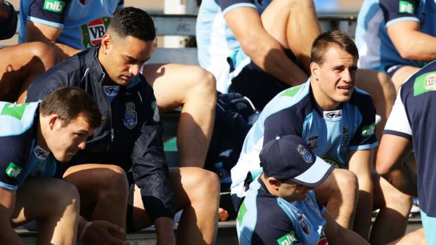 Disappointment: John Sutton, second from left, sits with Josh Reynolds before learning of his omission from the NSW State of Origin side.