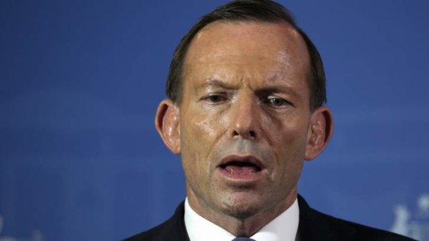 Prime Minister Tony Abbott addresses the media during a press conference in Bali.