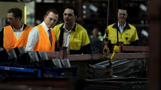 Tony Abbott visits a Ford factory in Geelong during his time as opposition leader.