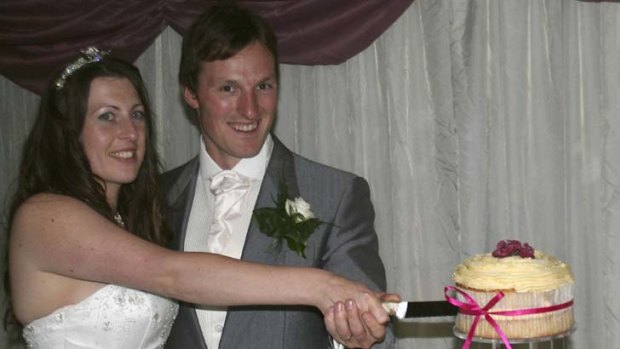 Short-lived marriage ... Catherine Mullany and her husband Ben cut their wedding cake.