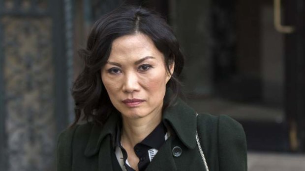 End of a power couple: Wendi Deng, wife of Rupert Murdoch, departs New York State Supreme Court after a divorce hearing in New York.