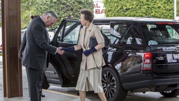 Princess Anne, Princess Royal is greeted by Lord Samuel Vestey.