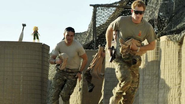 Prince Harry  races  to scramble his Apache helicopter at Camp Bastion.