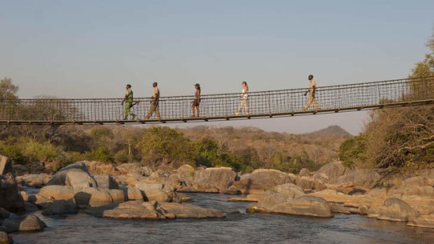 Access to the Mkulumadzi Lodge is by a swing bridge.
