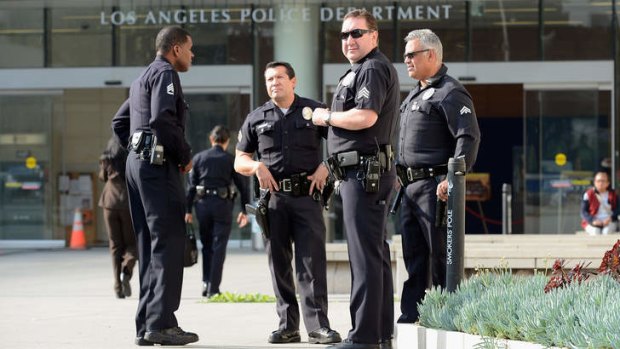 LAPD officers outside police headquarters in February.