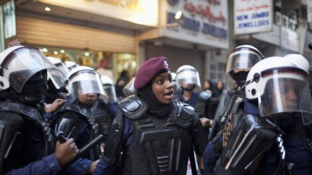 Female riot police take on protesters demanding the release of a hunger-striking activist.