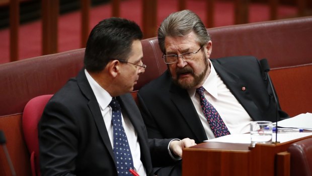 Senators Nick Xenophon and Derryn Hinch during Question Time in the Senate. Hinch pushed for the ban on registered child sex offenders travelling overseas.