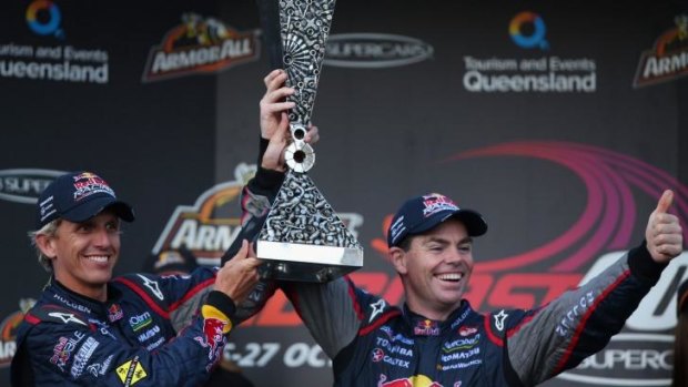 Luff, left, in happier times at Red Bull with Craig Lowndes.