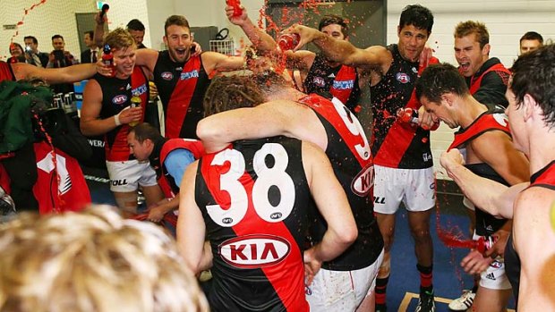 The Bombers celebrate after their round-one win over Adelaide.