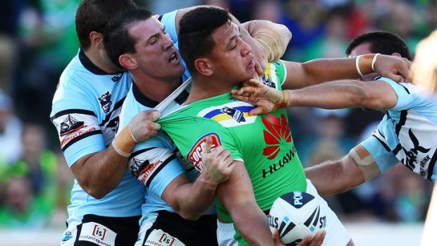 Tug-of-war ... Josh Papalii, who starred in the Raiders' final against the Sharks.