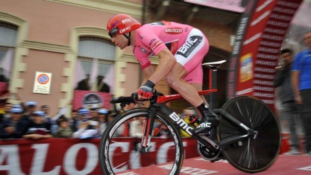 Cadel Evans slipped to second place overall after finishing third in the stage 12 time trial.