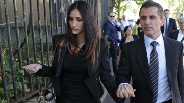 Demonstration: Simon Gittany, pictured with new girlfriend, showed the court how he attempted to save Lisa Harnum.