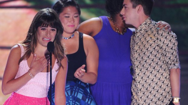 Lea Michele thanks fans with fellow <i>Glee</i> actors Jenna Ushkowitz, Amber Riley and Kevin McHale, who accepted an award for <i>Glee</i> at the Teen Choice Awards 2013 in LA.