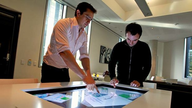 Collaborative learning ... PhD candidates at the University of Sydney Roberto Martinez and Richard Gluga with an interactive table.