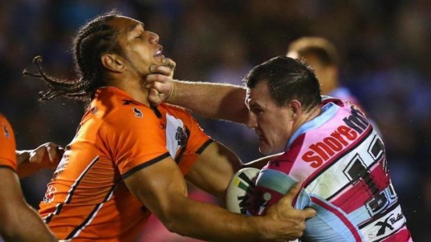 Paul Gallen offers a don't argue to Martin Taupau.