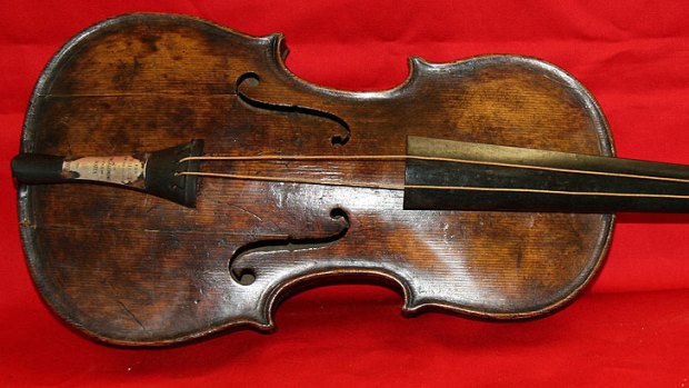 The violin that band leader Wallace Hartley played as the Titanic sank has been confirmed as genuine.