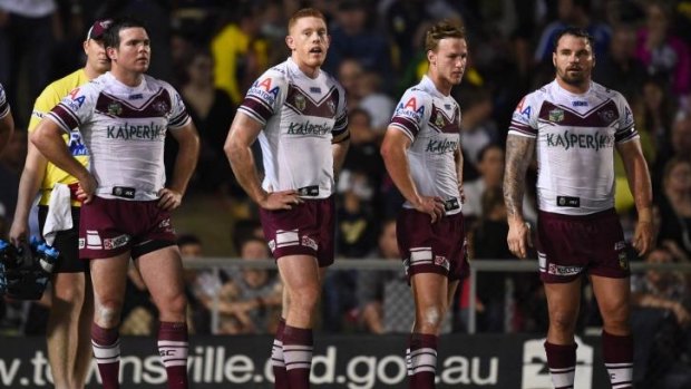Not to be: Manly players await a conversion attempt on Saturday night.