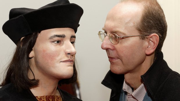 Any likeness? ... Michael Ibsen, right, a descendant of England's King Richard III, poses with a plastic model made from the recently discovered skull of the king.