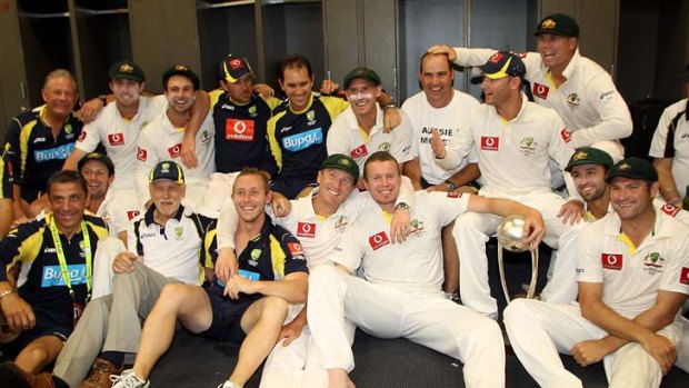 Job well done &#8230; the Australian players and staff celebrate yesterday after the team won the fourth Test of the Border-Gavaskar series.