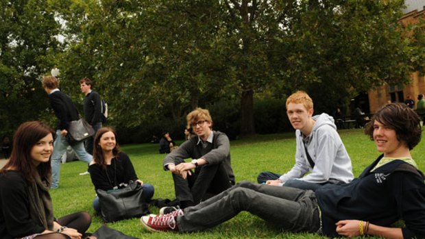 Students Alexandra, Emily, Huw, Matt and Lachlan on Melbourne University's south lawn yesterday.
