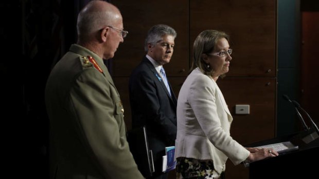Australian Sex Discrimination Commissioner Elizabeth Broderick, Defence minister Stephen Smith and Chief of the Defence Force General David Hurley.