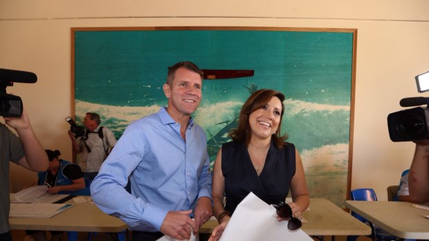 NSW Premier Mike Baird casts his vote with his wife Kerryn in the State election at the Queenscliff Surf Life Saving Club in Manly on Saturday 28 March 2015. Photo: Andrew Meares