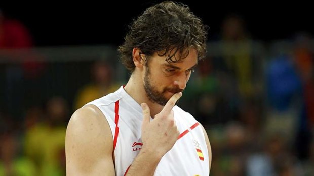 Spain's Pau Gasol walks off the court during the game.
