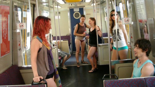 Commuters let it all hang out on a Brisbane train.