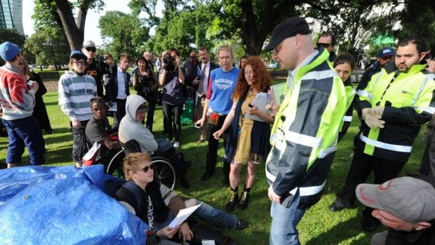 Occupy Melbourne protesters are ordered to pack up tents and other structures.