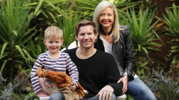 Simon Meredith with his wife, Leiza, and son Hamish on June 25 this year, 11 days after he suffered a brain haemorrhage.