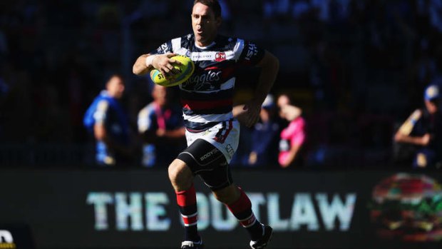 Old blokes can run: Brad Fittler races away to score against the Broncos after a crowd-pleasing intercept.