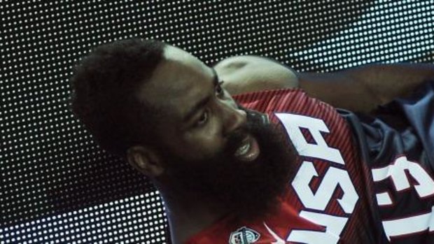 US forward James Harden falls during the win over the Dominican Republic.