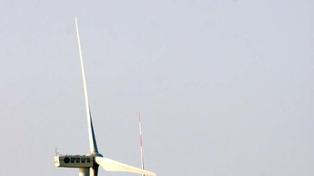 Blowing our way: Giant wind turbines being constructed outside Nantong city in China's Jiangsu province.