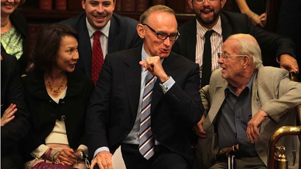 Foreign Minister Bob Carr said his wife (pictured left) will continue to accompany him on overseas trips.