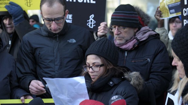 Ensaf Haidar (centre) the wife of Saudi blogger Raif Badawi, at a vigil in Montreal on January 13.