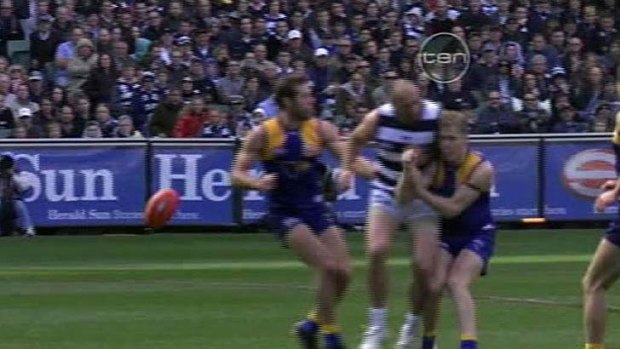 James Podsiadly bumps West Coast's Adam Selwood during the second preliminary final.