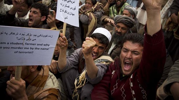 Anger: Afghan demonstrators marched to the parliament complex in Kabul demanding the removal of US forces from Warduk.