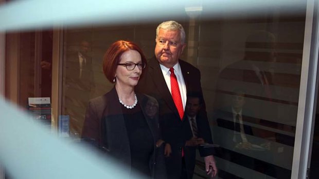 Corridors of power: Prime Minister Julia Gillard and chief scientist Ian Chubb in Sydney on Friday.