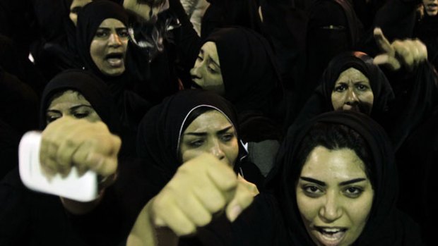 Shiite anti-government protesters chanting slogans in Manama.