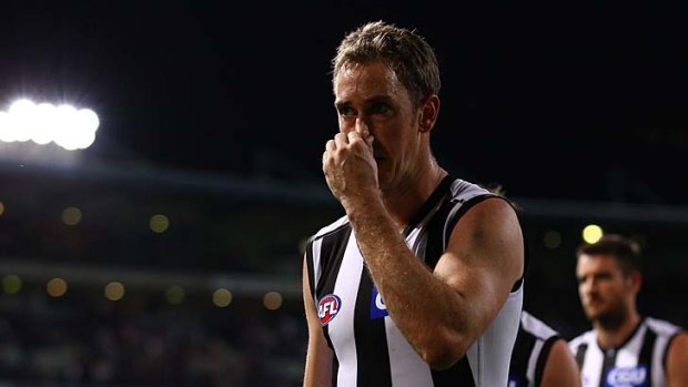 The unbearable stench of defeat? Nick Maxwell leads the Pies from the ground after the loss to Fremantle.